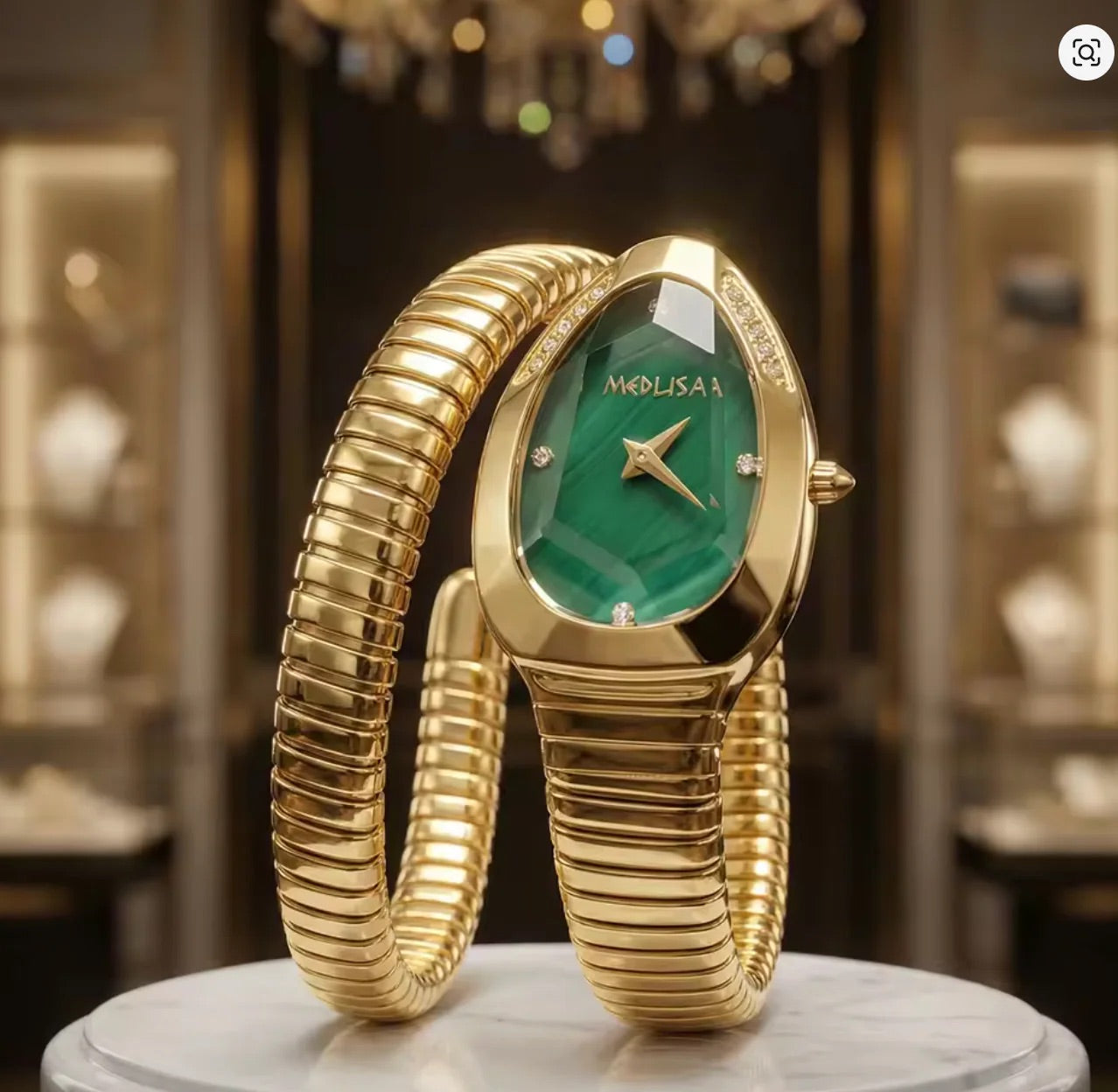 Luxuriöse goldene Armreih-Uhr in Schlangenform