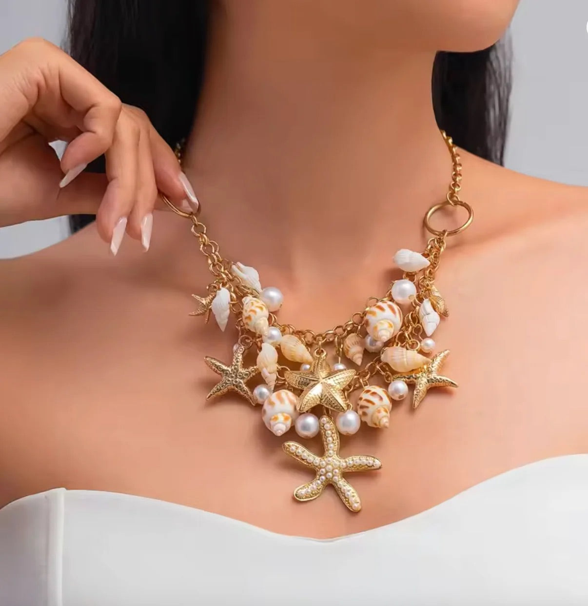 Boho Ocean – Mehrreihige Halskette mit Seesternen und Muschel-Quasten